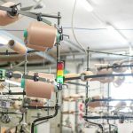 immagine dei macchinari di un'azienda tessile per dare l'idea del progetto sustainhubility a malpensafiere
