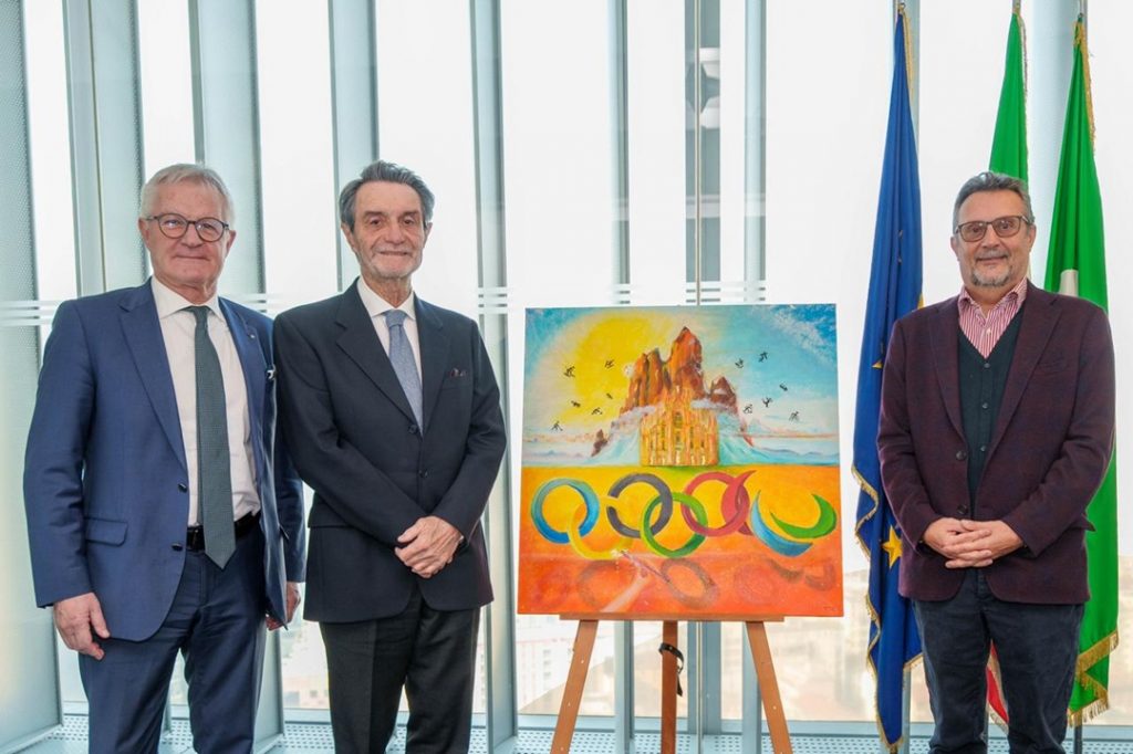 A Palazzo Lombardia l'opera 'Naturarte olimpica' dedicata ai giochi invernali Milano cortina 2026. Nella foto, da sinistra il sottosegretario Ruggero Invernizzi, il presidente della Regione Lombardia Attilio Fontana e l'artista Gianluca Piotti