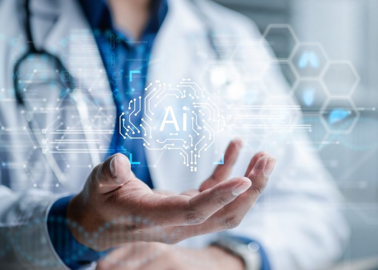 immagine di medico con schermo con scritta AI per dare idea del bando 'STEP Tecnologie Strategiche' su innovazione, in particolare su evento dedicato a progetti vincitori