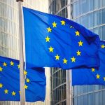 Bandiere dell'Ue il sottosegretario Cattaneo a incontro sulla gestione dei fondi di coesione