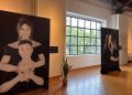 La conferenza stampa della mostra fotografica 'Women for women against the violence' che parla di tematiche di tumore al seno e violenza di genere. L'immagine ritrae alcuni ritratti delle donne che si sono prestate per il progetto